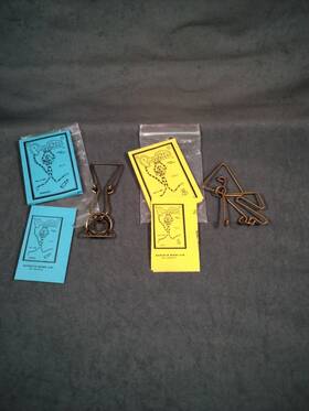 Puzzletts 008623001022 2 Vintage Wire Puzzles - # 303 Ueey And #103 Maiden
