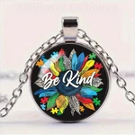 Colorful Sunflower & Puzzle Design "be Kind" Round Glass Pendant Necklace. Fixed Price $14.88.
