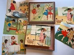 Vintage German Cloth Doll Tea Set Party Lithographed Toy Puzzle Block Box. Fixed Price $45.00.