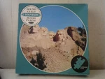Whitman Round Guild Mount Rushmore Black Hills South Dakota 650 Piece 23" Puzzle. Fixed Price $29.99.