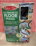 Melissa & Doug Tracks Floor Puzzle Race Around The World. Fixed Price $15.00.