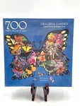 Graceful Garden 700 Pc Jigsaw Puzzle Artwork Russell Cobane Shaped Bits & Pieces. Fixed Price $27.00.