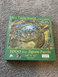 Sunsout 1000 Piece Puzzle Turtle World By Lewis T. Johnson - Sealed. Fixed Price $15.00.