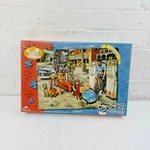 Serendipity 550 Piece Jigsaw Puzzle Of "gassing Up" # 35008 18"X24". Fixed Price $22.39.