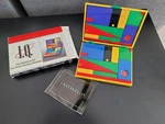 Vintage 1980S I.q. Stationery Kit Tangram Puzzle Set With Box & Instructions. Fixed Price $48.00.
