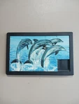 Damert Company Dolphin Slide Puzzle 2000. Fixed Price $10.00.