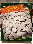 Silver Dollars World's Most Difficult Jigsaw Puzzle Double Sided Buffalo Games. Fixed Price $14.98.