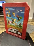 New Super Mario Bros. Wii Collectors Puzzle 550 Pieces. Fixed Price $19.95.