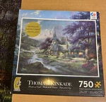 Ceaco Thomas Kinkade Metallic 750 Piece Puzzle Called Clocktower Cottage. Fixed Price $21.00.