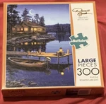 Buffalo Games Cresent Moon Bay Art By Darrell Bush 300 Large Piece Cabin Puzzle. Fixed Price $11.99.