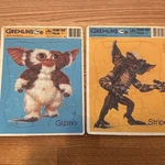 Gremlins 1984 Gizmo And Stripe Golden Frame Tray Puzzles. Fixed Price $25.00.