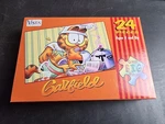 Factory Sealed Garfield Jigsaw Puzzle Cooking 9X12 Vista 24 Big Pieces. Fixed Price $12.95.