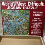 Buffalo Games World's Most Difficult Puzzle Fishing Double Sided 529 Pcs. Fixed Price $15.99.