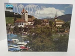 New Hasbro Berner Oberland Switzerland 1000 Piece Puzzle Guild Boats Castle. Fixed Price $10.99.