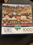 Charles Wysocki 1000 Piece Buffalo Jigsaw Puzzle - Sleepy Town West. Fixed Price $7.00.
