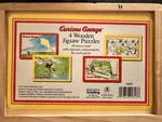 Schylling 2003 Curious George Wooden Jigsaw Puzzles 48 Pieces Storage Box. Fixed Price $22.57.