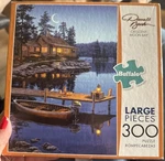 Buffalo Games Cresent Moon Bay Art By Darrell Bush 300 Large Piece Cabin Puzzle. Fixed Price $6.99.