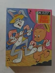 1977 Golden Dancing Bugs Bunny & Porky Pig 99 Piece Jigsaw Puzzle Sealed New. Fixed Price $8.00.