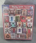 White Mountain Puzzles Christmas Holiday Doors - 1000 Piece Jigsaw 24X30. Fixed Price $14.99.