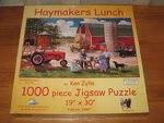 Sunsout 1000 Pc Puzzle Haymakers Lunch. Fixed Price $9.00.
