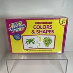 Scholastic First Learning Puzzles: Colors & Shapes New Ages 3+. Fixed Price $12.95.
