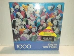 Factory Sealed Snoopy Dog Of 1000 Faces Authentic Springbok Jigsaw Puzzle. Fixed Price $62.50.