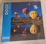 Springbok By Hallmark 2000 Piece Puzzle Flying Colors - Balloons. Fixed Price $19.00.
