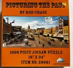 Sunsout Puzzle 1000 Piece Picturing The Past Rod Chase 16X34 39061. Fixed Price $7.00.