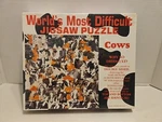 Worlds Most Diffcult Jigsaw Puzzle Cows By Buffalo Games - New & Sealed. Fixed Price $19.99.