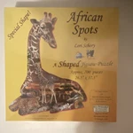 Sunsout African Spots Shaped Jigsaw Puzzle 700 Pieces Eco-friendly Hidden Images. Fixed Price $12.97.