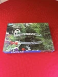 New Guild 550 Piece Jigsaw Puzzle Covered Bridge Garden Scene Country Landscape. Fixed Price $9.81.