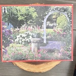 Rainbow Works Garden Arch 1000 Piece Interlocking Cardboard Jigsaw Puzzle. Fixed Price $7.00.