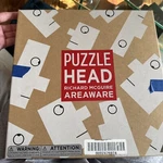 Areaware Puzzle Head By Richard Mcguire. Fixed Price $50.00.