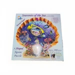 Sunsout Jigsaw Puzzle = Souvenirs Of The By Lori Schory Seashell Shaped New. Fixed Price $19.99.