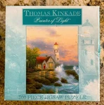 Older (2002) Ceaco Jigsaw Puzzle; Beacon Of Hope By Thomas Kinkade; 300 Pcs. Fixed Price $8.95.