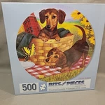 Bits And Pieces Round Jigsaw Puzzle Picnic Supper By Christopher Nick. New. Fixed Price $14.95.