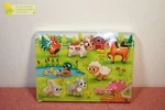 B. Toys Peg Puzzles Peek & Explore Farm Animals Barnyard. Fixed Price $18.99.