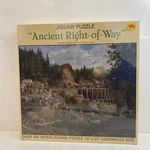 New Sealed Ancient Right-of-way 1983 Nordevco Jigsaw Puzzle Russ Vickers 16X20. Fixed Price $19.00.