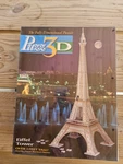 Vintage Milton Bradley PUZZ-3D Eiffel Tower 703 Piece Puzzle New Unopened Box. Fixed Price $32.00.