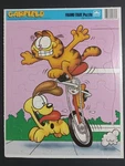 Vintage 1978 Golden Brand Garfield & Odie Unicycle Frame Tray 24 Piece Puzzle. Fixed Price $10.00.