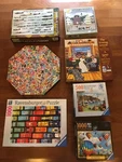 Ravensburger, Springbok, Sunsout, Bits & Pieces, Eurographics Puzzles. Fixed Price $35.00.