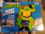 1990 Teenage Mutant Ninja Turtles Michaelangelo Giant Floor Puzzle 20PC Roseart. Fixed Price $65.99.