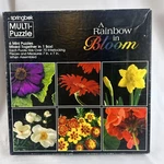 Springbok Puzzle Rainbow Bloom 6 Mini One Box Each 7X7 70 Pieces. Fixed Price $20.00.