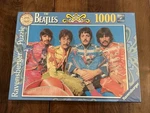 Ravensburger The Beatles Sgt. Pepper 1000 Piece Jigsaw Puzzle, 20"X27" Sealed. Fixed Price $49.99.
