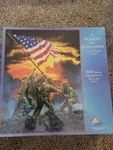 Sunsout Military Puzzle Moment To Remember By Steven Michael Gardner. Fixed Price $25.00.