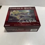 Primrose Crossing 750 Piece Puzzle Charles White Factory Sealed New 27 X 17. Fixed Price $12.75.