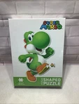 Usaopoly Yoshi Shaped Puzzle 200 Pieces Nintendo Super Mario 16"X24" Sealed. Fixed Price $22.75.