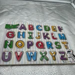 Melissa & Doug Alphabet Peg Puzzle See-inside. Fixed Price $12.00.
