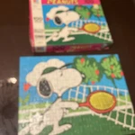 Jigsaw Puzzle Peanuts Snoopy Tennis 1958 Milton Bradley 100 Piece 11 X 14. Fixed Price $13.00.