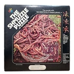 Vintage Shmuzzles Puzzle Can Of Worms Jigsaw 168PC Salamanders 1980. Fixed Price $26.95.